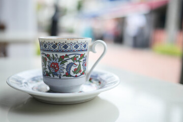 a cup of turkish coffee on table outdoor 