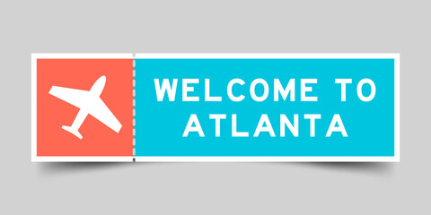 Orange and blue color ticket with plane icon and word welcome to atlanta on gray background - obrazy, fototapety, plakaty