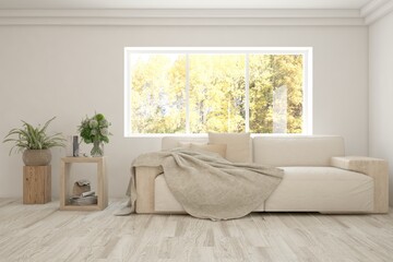 Stylish room in white color with sofa and autumn landscape in window. Scandinavian interior design. 3D illustration