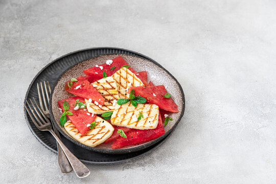Summer salad of watermelon, haloumi cheese,fresh mint leaves	.