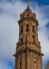 Fototapeta na wymiar BELL TOWER OF THE CATHEDRAL OF ANTEQUERA WITH BLUE SKY