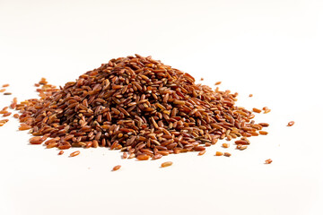 raw red rice isolated on white