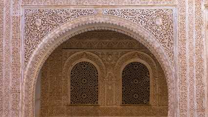 Fototapeta na wymiar ARABIC ARCHITECTURE OF THE ALHAMBRA, MOSAICS, LETTERING