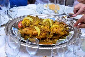 Foto auf Alu-Dibond Moroccan-style chicken with olives and lemon. Served as a main dish at weddings © issam