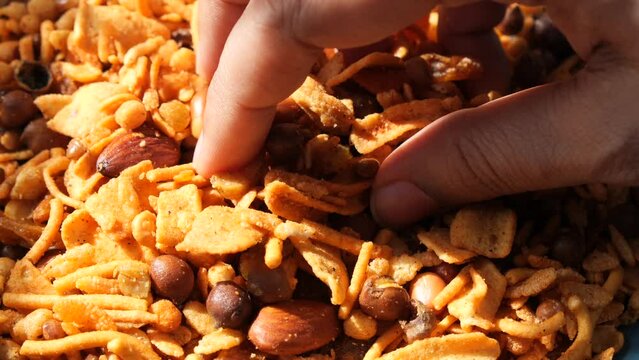 Bombay mix or Chiwda on black background 