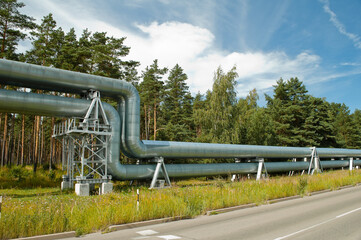 pipeline, in the photo the pipeline is close-up, the blue sky is in the background