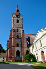 The unfinished Gothic church of St. Procopius and the Baroque Prelature