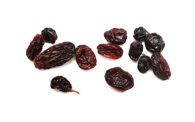 Dried dark raisins on a white background.