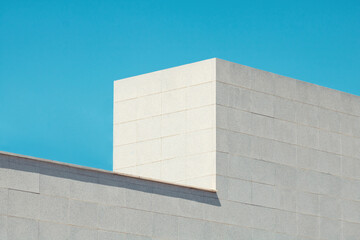 Urban architeture. Close up of a modern building with sky.