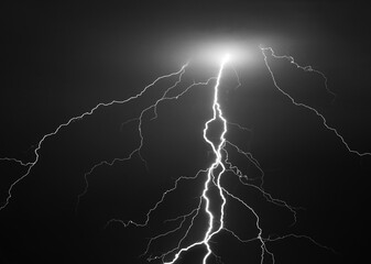 Fork lightning striking down during summer storm