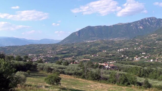Countryside with farms in the valley and on the hills. Sant’Agata dei Goti, Benevento, Italy