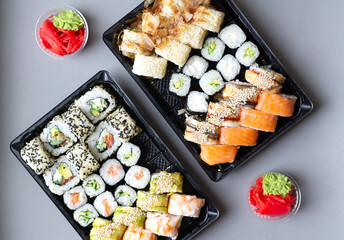 Sushi rolls set in plastic box for takeaway