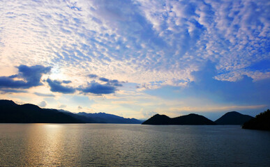 Scenery of lake and mountain before sunset and blue sky at Srinagarind dam, Kanchanaburi ,Thailand