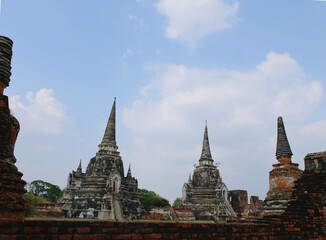 Fototapeta premium Old Buddha at Old Beautiful Thai Temple Wat Pra Si Wanphet at Ayutthaya, Ayutthaya Historical Park of Thailand