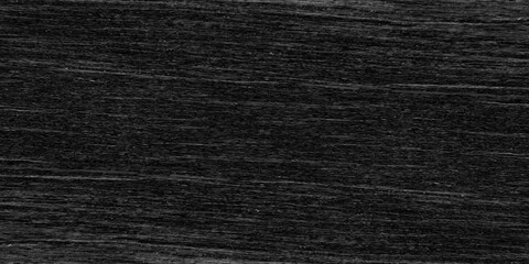 Abstract grainy and scratched black fabric texture,  luxury black grunge texture, grainy and scratched black paper texture, old style luxury black background with grunge texture.	