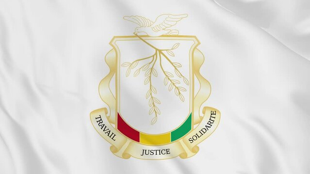 national emblem coat of arms or symbol of Guinea Bissau in waving flag. smooth 4k video seemless loop