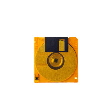 Plastic Yellow Floppy Disk Isolated On White Background.