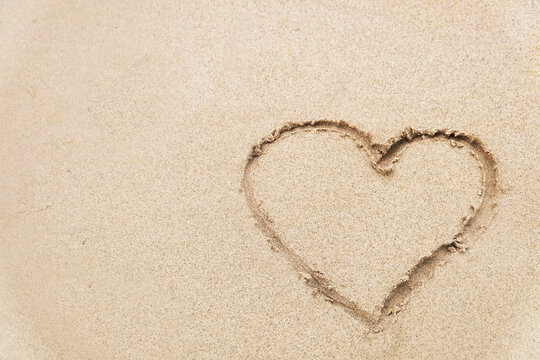 Heart write down on Sand at the Beach for Wallpaper or texture for designing, Love, Valentine's Day