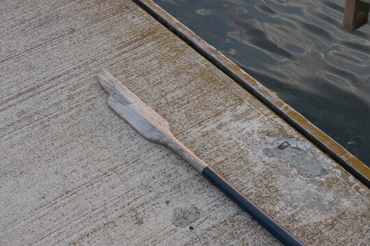 Broken wooden oar from a boat