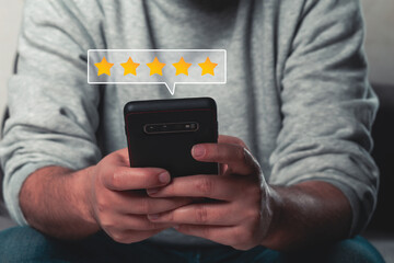 Customer review satisfaction feedback survey concept, User give rating to service experience on online application.