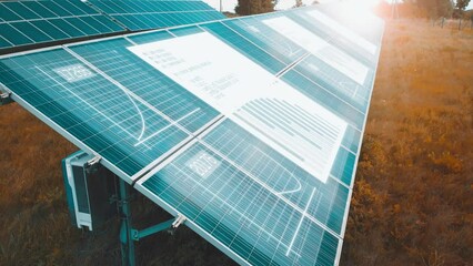 Solar panels in rows, with HUD of energy graphs poping in . Solar battery farm, sustainable energy, ecology, electrical power plant 