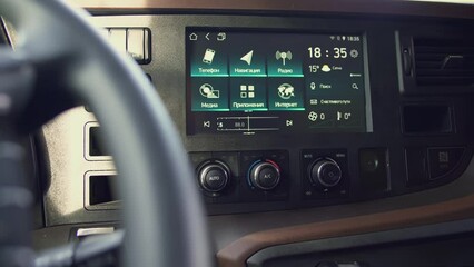 Close up of wheel and dashboard of a truck machine. Scene. View inside of a truck car interior.