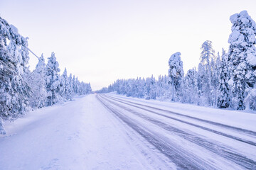 Winter road covered in ice and snow