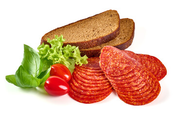 Spanish pork chorizo sausage slices, close-up, isolated on white background.