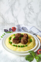 Fried Cutlets on Mashed potato. Fried meatballs
