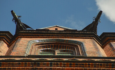 gargoyles on top of a church roof
