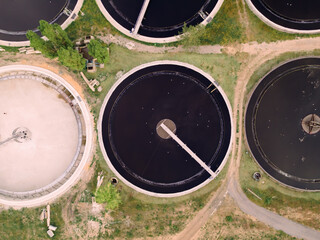 Sewage and wastewater treatment station basin sedimentation with toxic city waste water. Wastewater filtering reservoir