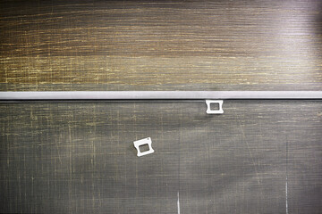 Mosquito net handle close-up in factory production, top view.