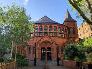 Fototapeta premium London, UK. The Tabernacle is a Grade II-listed building in Powis Square, Notting Hill, west London, England, built in 1887 as a church. The building boasts a curved Romanesque façade