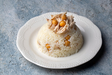 Traditional delicious Turkish food; Rice with chickpeas and chicken (Turkish name; Tavuklu nohutlu pilav or pilaf)