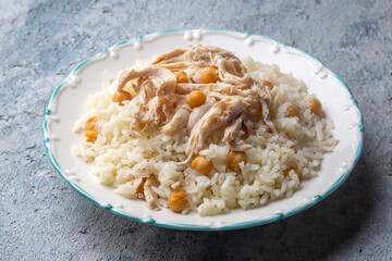 Traditional delicious Turkish food; Rice with chickpeas and chicken (Turkish name; Tavuklu nohutlu pilav or pilaf)