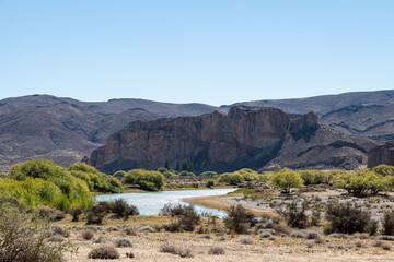 panoramic view of a river in the mountain ranges
