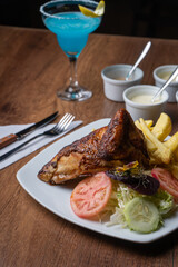 Grilled chicken or chicken with potatoes, is a typical dish of Peru.