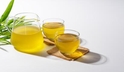 Cold green tea placed on a white background.