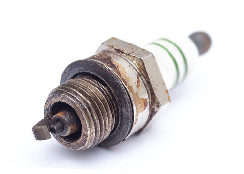Used spark plug on white