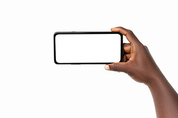 Black hand holding phone facing camera isolated on white background. blank screen, phone screen...