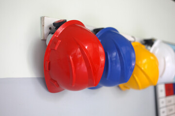 Disaster preparedness helmet hanging on a wall