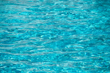 Water in swimming pool, background with high resolution. Wave abstract or rippled water texture.