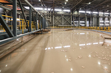 Brown liquid material in contemporary gravity thickener