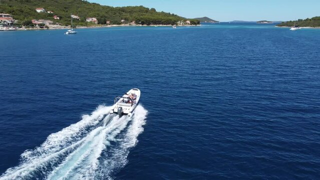 A close up view of a boat sailing through Zadar in Croatia