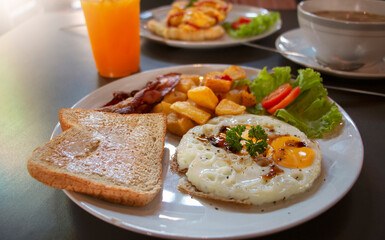 fresh American breakfast on white plate