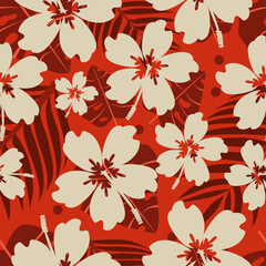 Seamless hibiscus and palm leaves pattern on orange background