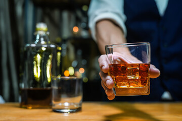 Bartender Serve Whiskey, on wood bar, 