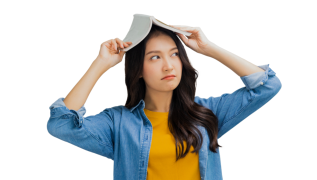 Beautiful Asian woman boring and   holding book on her head, tired and bored young girl student