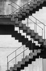 Abstract architecture background, square concrete stairway perspective, stairwell, black and white photo © Elena_Alex