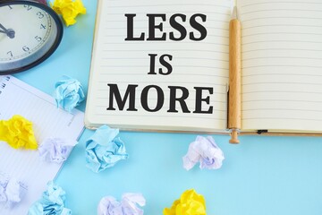 less is more text writen in Notebook, efficiency concept